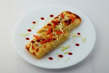 Mexican tacos with meat, beans and salsa.