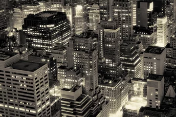 Papier Peint photo New York Les bâtiments de la ville de New York illuminés la nuit