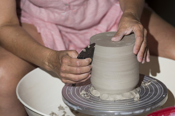 woman working on the lathe