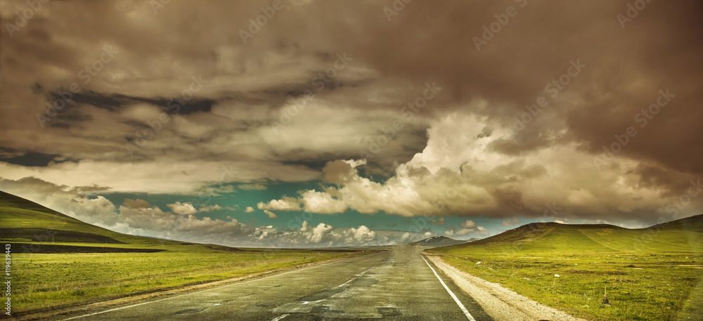 Wall mural road under sky