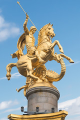 Fototapeta premium Tbilisi, Golden Monument of St. George killing the dragon on Fre