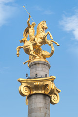 Fototapeta na wymiar Tbilisi, Monument of St. George killing the dragon on Freedom Sq