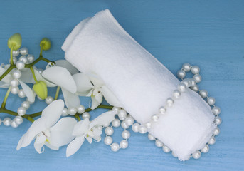 health spa with white orchid and white towel