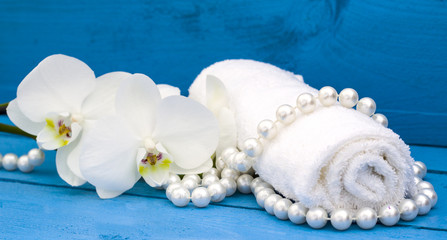 health spa with white orchid and white towel
