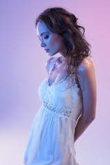 Beautiful Woman In White Dress And Blue Light 
