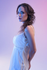 Beautiful Woman In White Dress And Blue Light 