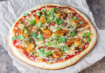 Seafood. Fast food. Homemade Shrimps prawns pizza with herbs