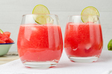 Watermelon fresh juice with mint leaves and lime citrus