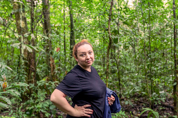 Naklejka na ściany i meble Caucasian Woman Traveling Deep In The Cuyabeno Jungle