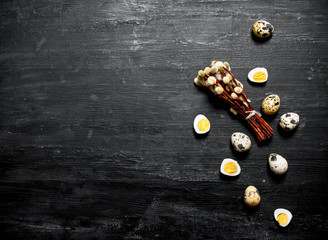 Quail eggs and willow branches.