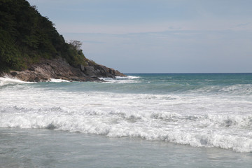 Fototapeta na wymiar Strong waves on the beach in Phuket, Thailand.
