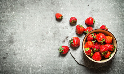 Ripe strawberries in a bowl.