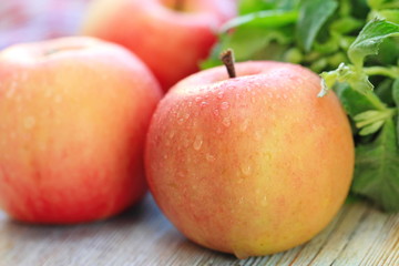 Fresh apples on the wooden table