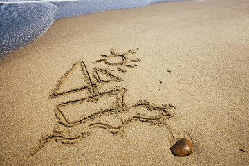 Ship painted on sand beach