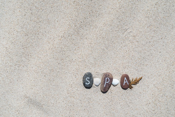 Fototapeta na wymiar stones on the sand background