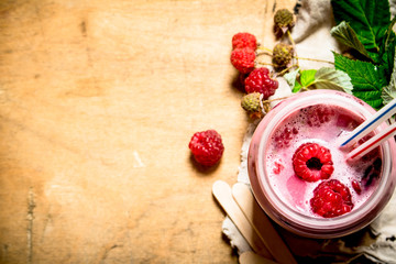 Obraz na płótnie Canvas Raspberry smoothie with different berries.
