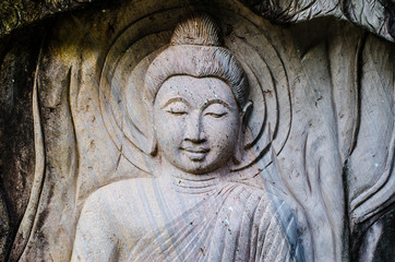 Fototapeta na wymiar Buddha statue Stone Carving