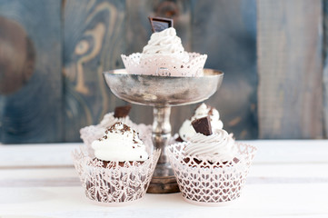 Five delicious cupcakes with chocolate chips