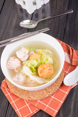 variety of seafood balls and chinese cabbage soup