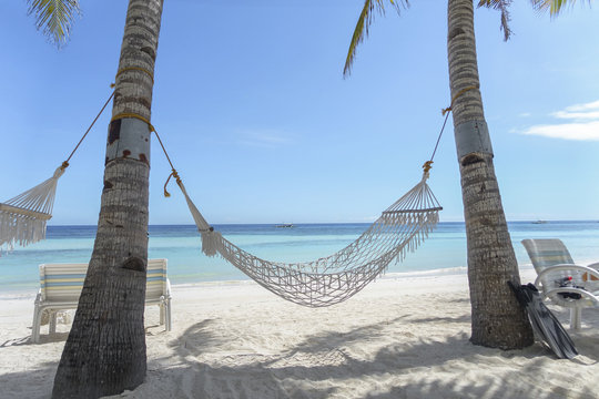 Hammock on Tropical Paradise Beach, With White Sand and Turquoise Sea - Panglao, Bohol - Philippines