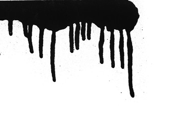 Black color spray paint on a white background paper