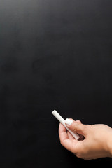 Empty blank black chalkboard with chalk traces