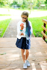 Happy beauty kid schoolgirl