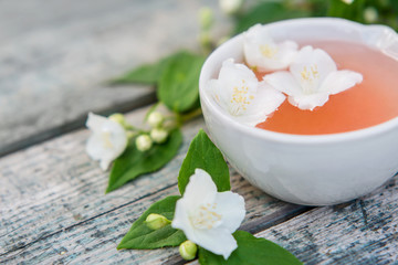 Spa and wellness setting with sea salt, oil essence, jasmin flow