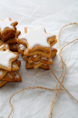 Fototapeta na wymiar Gingerbread star cookies with icing