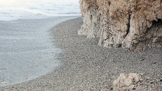 Waves beat against the wall of the salt