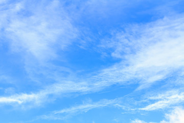 Obraz premium Blue sky background with white clouds. The vast blue sky and clouds sky on sunny day. White fluffy clouds in the blue sky.