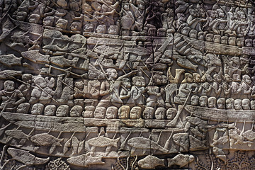 Intricate Stone Carvings on the Wall of Angkor Wat in Siem Reap, Cambodia