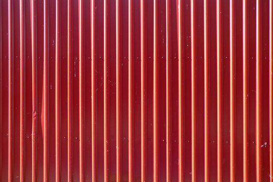 Red long goffered metal texture, corrugated steel