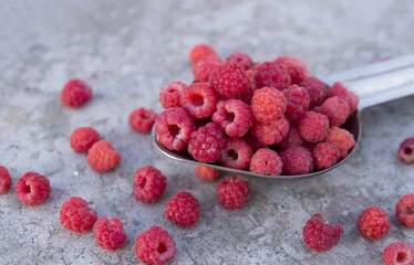 raspberries in the metallic spoon