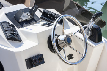 Well equipped dashboard mounted on fiberglass fishing boat