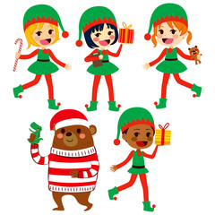 Cute little Santa helpers children and bear with presents wearing Christmas hat
