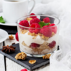 Breakfast concept. Coffee muesli granola berries homemade yogurt