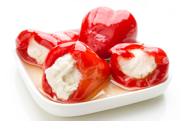 serving of marinated red peppers stuffed with cheese - obrazy, fototapety, plakaty