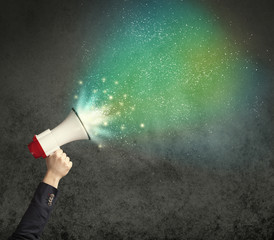 Hand holding megaphone