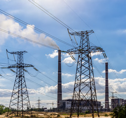 Coal power plant pollution and power lines.