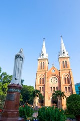 Fototapeta na wymiar Saigon Notre-Dame Cathedral Basilica on blue sky background in Ho Chi Minh city, Vietnam. Ho Chi Minh is a popular tourist destination of Asia.