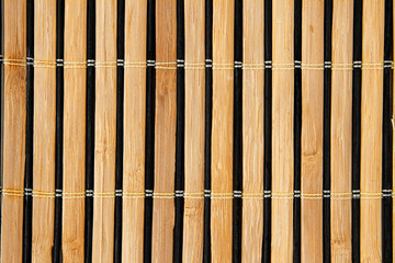 Bamboo mat for sushi cooking - background and textures.