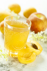 Glass of peach and apricot drink