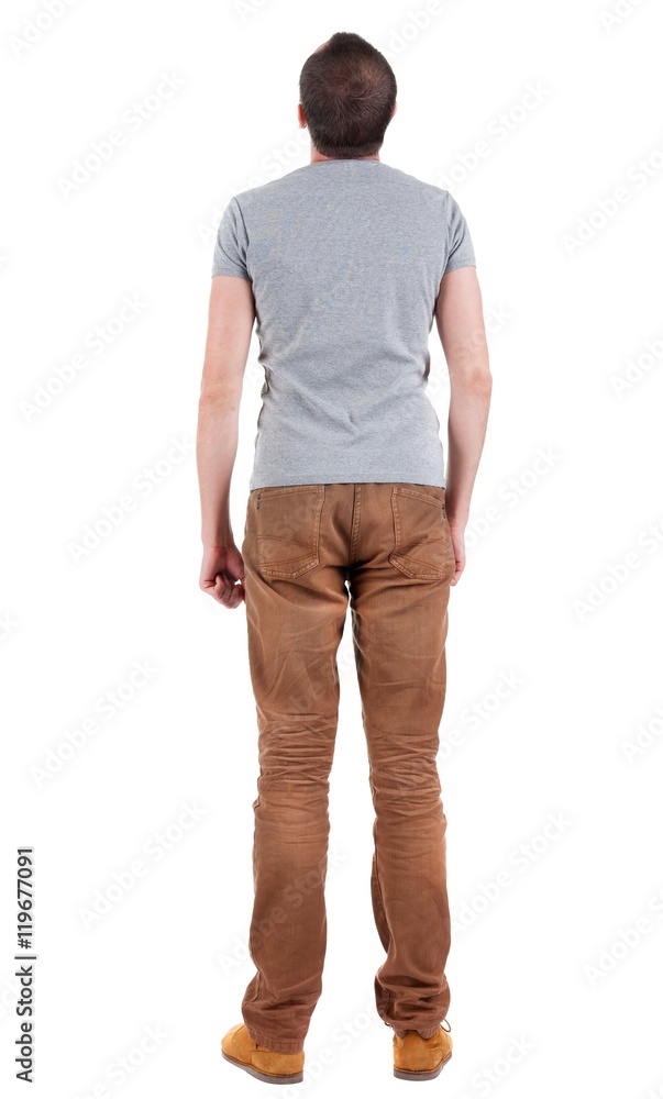 Poster Back view of handsome man in shirt and jeans  looking up.   Standing young guy. Rear view people collection.  backside view of person.  Isolated over white background.