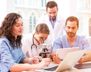 Fototapeta premium Medical team working at the hospital all together