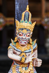 Wooden statuette of the deity in a Balinese temple