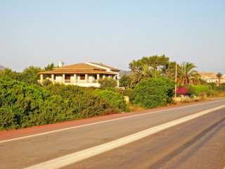 Fototapeta na wymiar Finca / vacation rental home with palms