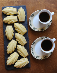 Cookies and coffee on the wooden table