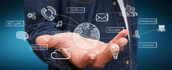 Businessman holding hand drawn multimedia icons