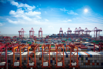 Closeup Industrial port with containers, Shanghai Yangshan deepwater port is a deep water port for container ships in Hangzhou Bay south of Shanghai, China. - obrazy, fototapety, plakaty